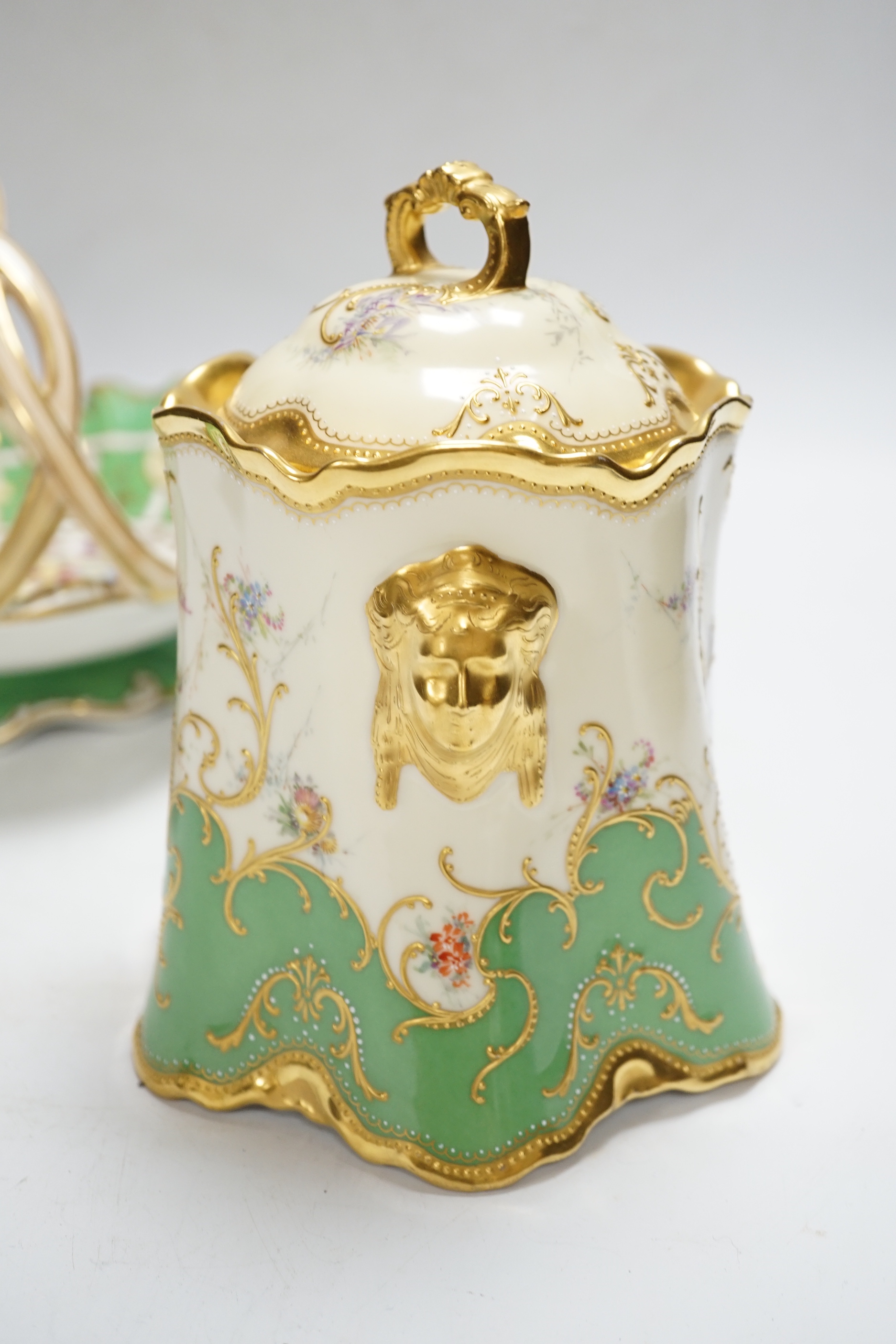 A Dresden jar and cover and a Victorian porcelain basket, tallest 18cm